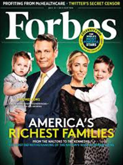 A magazine cover with four people and two children.