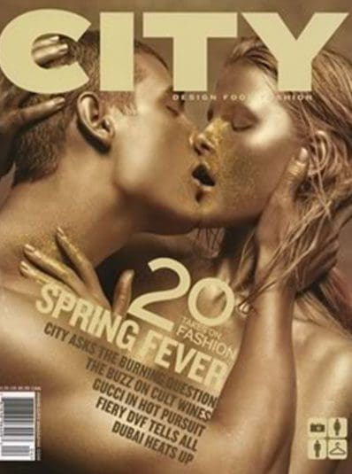 A magazine cover with two people kissing