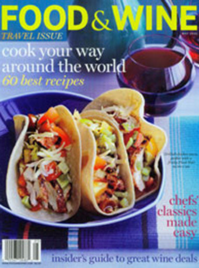 A magazine cover with two tacos on it.