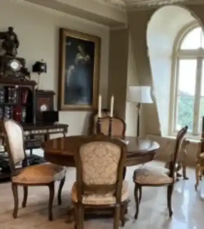 A dining room with chairs and tables in it